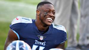 Titans receiver A.J. Brown smiling on the sideline